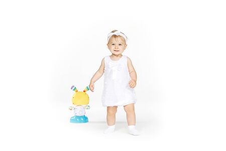 beautiful little girl all in white clothesの写真素材
