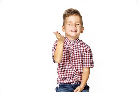 handsome boy in shirt on white backgroundの写真素材