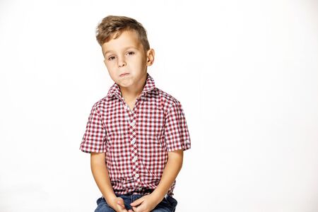 handsome boy in shirt on white backgroundの写真素材
