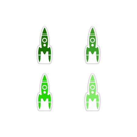Set of paper rocket stickers on white pattern.のイラスト素材