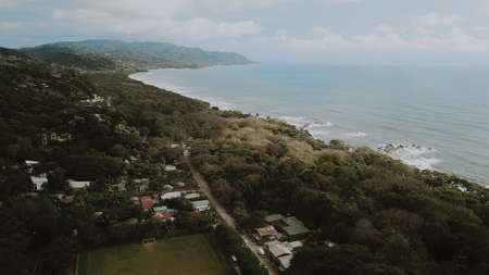 Cliff with crystal blue water in Costa Rica, Santa Teresa. Central America landscape from top view. Travel paradise destination for a couple in searching for adventure.の写真素材