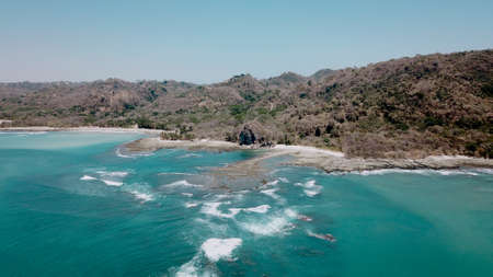 Cliff with crystal blue water in Costa Rica, Santa Teresa. Central America landscape from top view. Travel paradise destination for a couple in searching for adventure.の写真素材