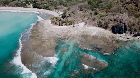 Cliff with crystal blue water in Costa Rica, Santa Teresa. Central America landscape from top view. Travel paradise destination for a couple in searching for adventure.の写真素材