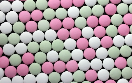 Rows of colored candy. Suitable for an abstract background.