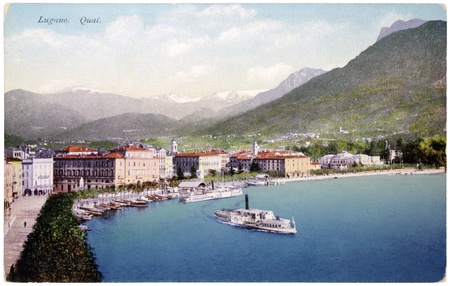 SWITZERLAND - CIRCA 1918: a postcard printed in SWITZERLAND shows bird's-eye view of Swiss town Lugano in the Italian-speaking canton of Ticino, circa 1918.のeditorial素材