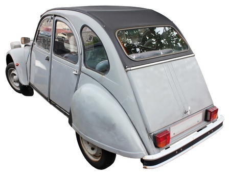 Small old rusty car isolated on white background のeditorial素材