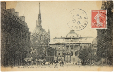 FRANCE - CIRCA 1913: A stamp printed by FRANCE shows Marianne the allegory of French Republic. Stamp is on the old  postcard shows Palace of Justice (Palais de Justice) in Paris, circa 1913.のeditorial素材