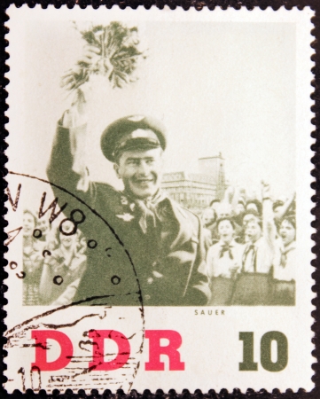 GERMANY - CIRCA 1961: a stamp printed by German Democratic Republic shows portrait of famous Soviet pilot and cosmonaut Gherman Titov, circa 1961 のeditorial素材