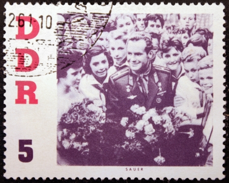 GERMANY - CIRCA 1961: a stamp printed by German Democratic Republic shows portrait of famous Soviet pilot and cosmonaut Gherman Titov, circa 1961 のeditorial素材
