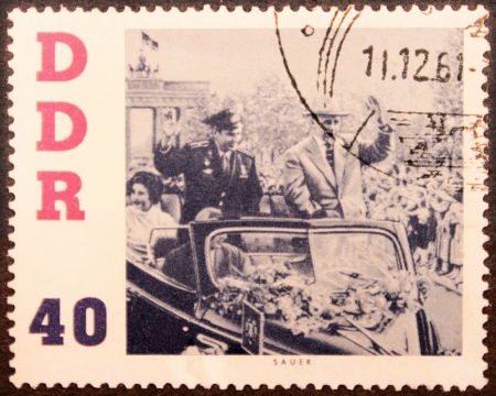 GERMANY - CIRCA 1961: a stamp printed by German Democratic Republic shows portrait of Soviet cosmonaut Gherman Titov and Chairman of the State Council of the German Democratic Republic Walter Ulbricht, circa 1961のeditorial素材