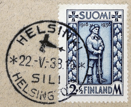 FINLAND - CIRCA 1938: a stamp printed by FINLAND shows image of Finnish soldier, circa 1938.のeditorial素材