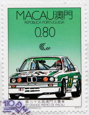 MACAU - CIRCA 1988: a stamp printed by PORTUGAL shows Macau Rally Racing, circa 1988.のeditorial素材