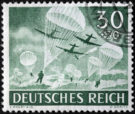 GERMANY - circa 1943: stamp printed by Germany, shows German Air landing troops, circa 1943.のeditorial素材