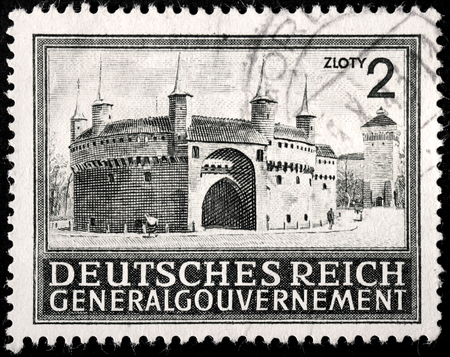 GERMANY - CIRCA 1941: A stamp printed by GERMANY shows view of Barbican of Krakow (Cracow), circa 1941のeditorial素材