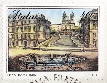 ITALY - CIRCA 1989: A stamp printed by ITALY shows view of The Spanish Steps (Scalinata della Trinita dei Monti) and Fountain of the Old Boat (Fontana della Barcaccia) in Rome, Italy, circa 1989.のeditorial素材