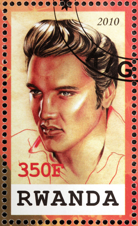 RWANDA - CIRCA 2010: A stamp printed by Republic of RWANDA shows image portrait of famous American singer Elvis Aaron Presley, circa 2010のeditorial素材