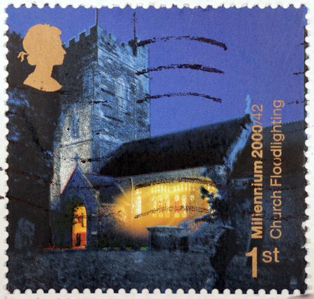 GREAT BRITAIN - CIRCA 2000: A stamp printed by GREAT BRITAIN shows image of the Floodlit  of St.Peter and St. Paul Church, Overstowey (Church Floodlighting Trust), circa 2000.のeditorial素材