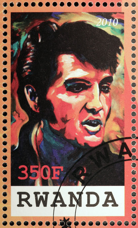 RWANDA - CIRCA 2010: A stamp printed by Republic of RWANDA shows image portrait of famous American singer Elvis Aaron Presley, circa 2010のeditorial素材