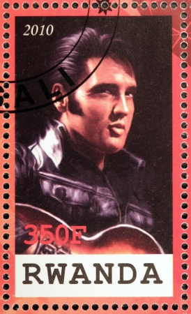 RWANDA - CIRCA 2010: A stamp printed by Republic of RWANDA shows image portrait of famous American singer Elvis Aaron Presley, circa 2010.のeditorial素材