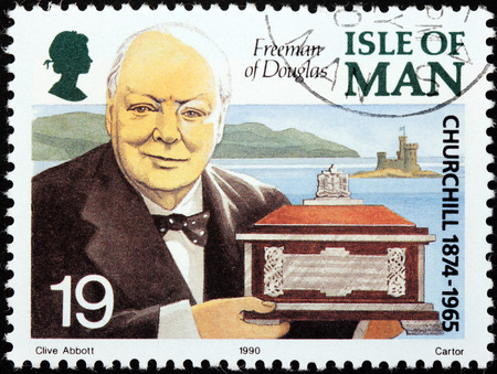 ISLE OF MAN - CIRCA 1990: a stamp printed by GREAT BRITAIN shows image portrait of famous British statesman, Prime Minister of the United Kingdom Sir Winston Churchill, circa 1990のeditorial素材