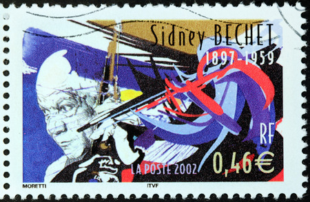 FRANCE - CIRCA 2002: A stamp printed by FRANCE shows image portrait of  famous American jazz saxophonist, clarinetist, and composer, circa 2002のeditorial素材