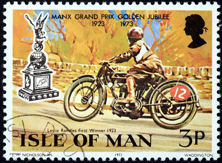 ISLE OF MAN - CIRCA 1973: a stamp printed by GREAT BRITAIN shows first winner of Manx Grand Prix motorcycle races (MGP) Leslie Radles, circa 1973.のeditorial素材
