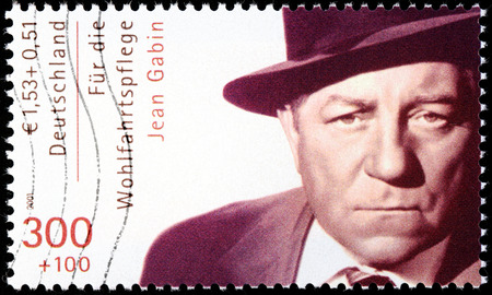 GERMANY - CIRCA 2001: A stamp printed by GERMANY shows image portrait of French actor Jean Gabin, circa 2001のeditorial素材