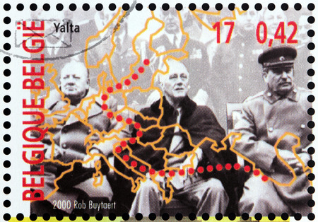 BELGIUM - CIRCA 2000: a stamp printed by BELGIUM shows Yalta (Crimea) Conference in February 1945 with Winston Churchill, Franklin D. Roosevelt and Joseph Stalin (Big Three), circa 2000.のeditorial素材