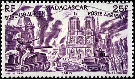 MADAGASCAR - CIRCA 1946: A postage stamp printed by MADAGASCAR shows Liberation of Paris (August 1944), circa 1946のeditorial素材