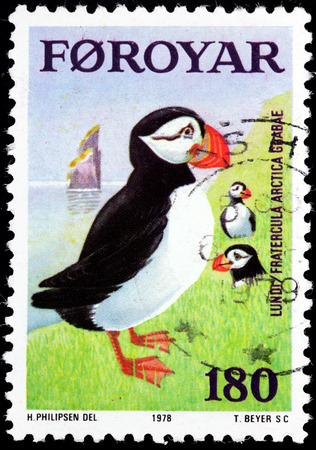 FAROE ISLANDS - CIRCA 1978: A stamp printed by FAROE ISLANDS shows Atlantic Puffin (Fratercula arctica), also known as the Common Puffin, is a species of seabird in the auk family, circa 1978のeditorial素材