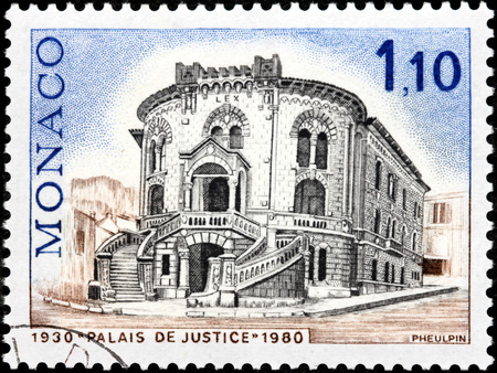 MONACO - CIRCA 1980: A stamp printed by MONACO shows view of Palais de Justice. This Palace was built in 1924, on the initiative of Prince Louis II and inaugurated on May 1st 1930, circa 1980のeditorial素材