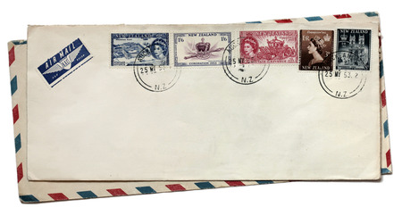 NEW ZEALAND - CIRCA 1953: A set of five stamps printed by NEW ZEALAND shows image portrait of Queen Elizabeth II, the State Coach, view of Buckingham Palace and Westminster Abbey, circa 1953のeditorial素材