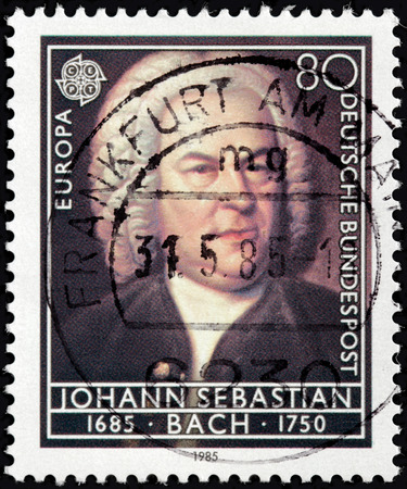 GERMANY - CIRCA 1985: A stamp printed by GERMANY shows image portrait of famous German composer and musician of the Baroque period Johann Sebastian Bach, circa 1985のeditorial素材