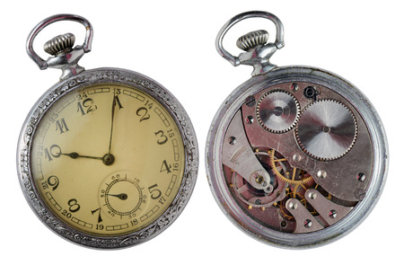 Two close up views of vintage pocket watch isolated on white background