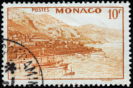 MONACO - CIRCA 1940: A stamp printed by MONACO shows view of Monte Carlo and the Mont Agel in the background, circa 1940のeditorial素材