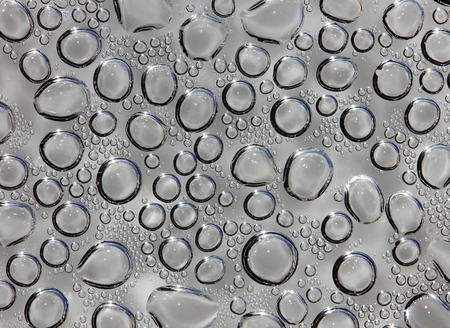 Closeup view of tea-kettle cover surface near boiling point temperature. Suitable for an abstract background.の写真素材