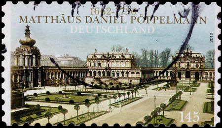 GERMANY - CIRCA 2012: A stamp printed by GERMANY shows view of Zwinger Palace, Dresden, built in Rococo style and designed by court architect Matthaus Daniel Poppelmann, circa 2012のeditorial素材