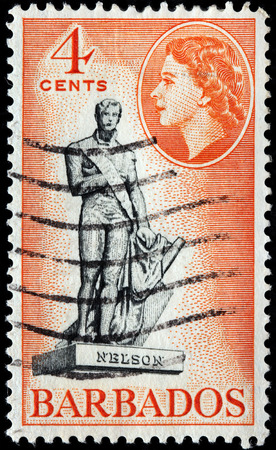 BARBADOS - CIRCA 1954: A stamp printed by BARBADOS shows view of Admiral Nelson statue in Bridgetown at Trafalgar Square (now renamed National Heroes' Square), Barbados, circa 1954のeditorial素材