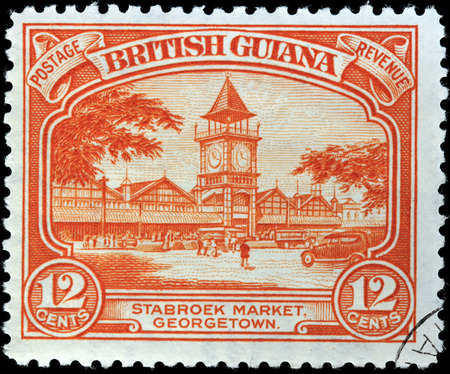BRITISH GUIANA - CIRCA 1934: A stamp printed by BRITISH GUIANA shows view of the Stabroek Market in Georgetown. Georgetown is the capital of Guyana, circa 1934のeditorial素材