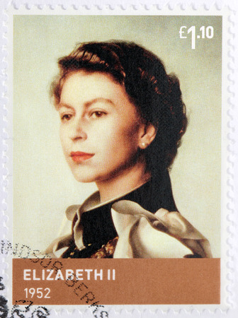 UNITED KINGDOM - CIRCA 2012: A stamp printed by GREAT BRITAIN shows image portrait of Elizabeth II - Queen of the United Kingdom and the other Commonwealth realms, circa 2012のeditorial素材