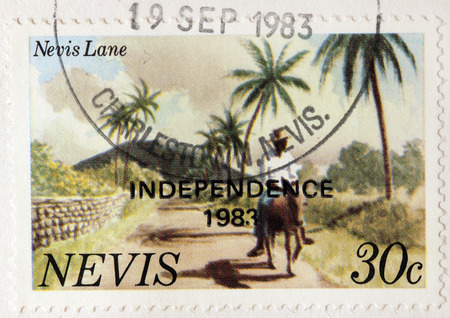 NEVIS - CIRCA 1983: A stamp printed by NEVIS shows view of Nevis Lane, circa 1983のeditorial素材