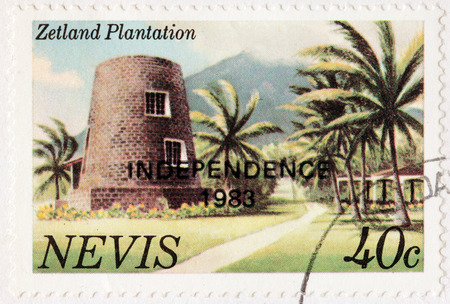 NEVIS - CIRCA 1983: A stamp printed by NEVIS shows view of Zetland Plantation, circa 1983のeditorial素材