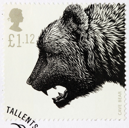 LUGA, RUSSIA - NOVEMBER 6, 2016: A stamp printed by GREAT BRITAIN shows Cave Bear - Ice Age Animal, circa 2006のeditorial素材