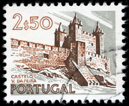 LUGA, RUSSIA - AUGUST 20, 2017: A stamp printed by PORTUGAL shows view of famous Castle of Santa Maria da Feira, circa 1975のeditorial素材