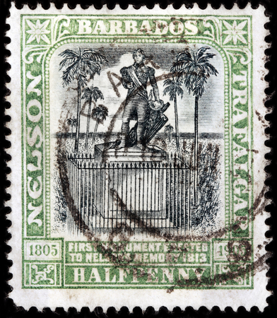 LUGA, RUSSIA - OCTOBER 17, 2017: A stamp printed by BARBADOS shows Admiral Nelson statue in Bridgetown at Trafalgar Square (now renamed National Heroes' Square), Barbados, circa 1907のeditorial素材