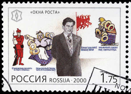 LUGA, RUSSIA - FEBRUARY 17, 2019: A stamp printed by RUSSIA shows image portrait of famous Russian poet, playwright, artist, and actor Vladimir Mayakovsky, circa 2000のeditorial素材