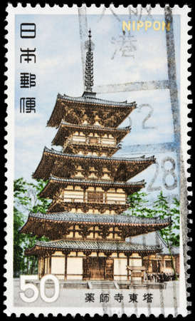 LUGA, RUSSIA - SEPTEMBER 02, 2019: A stamp printed by JAPAN shows East pagoda, Yakushi-ji - imperial and ancient Buddhist temple in Japan, located in Nara, circa 1976.のeditorial素材