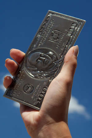 Metal hundred dollars are only souvenirの写真素材