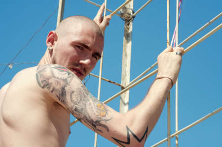 The young guy who is were fond tattooの写真素材