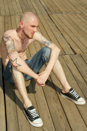 The young guy who is were fond tattooの写真素材